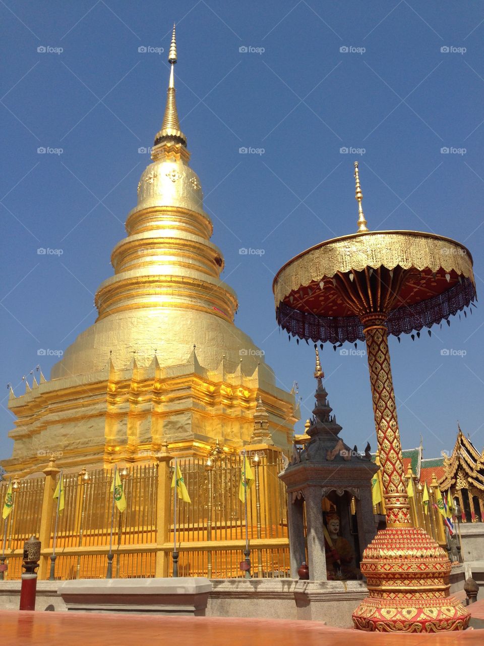 Golden Temple in Lumpoon, North Thailand. Gold Feeling in Peace. Buddha Worship . Nice Sky Wat Thai
