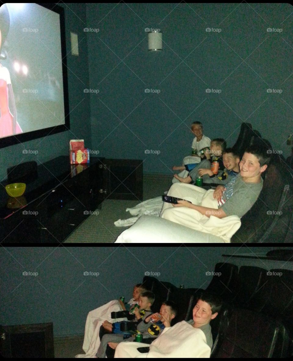 Family having fun watching movies in home theater!