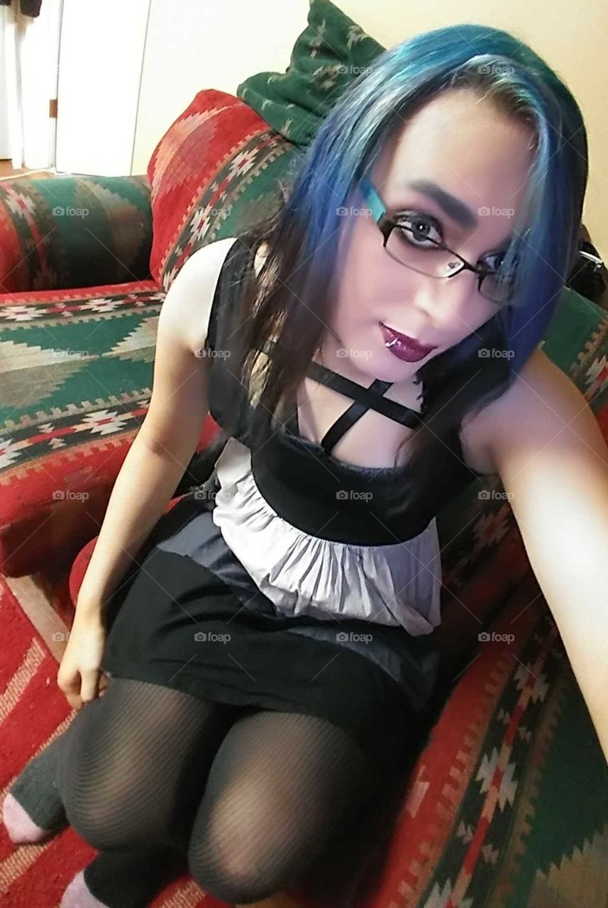 goth girl coloured hair on couch
