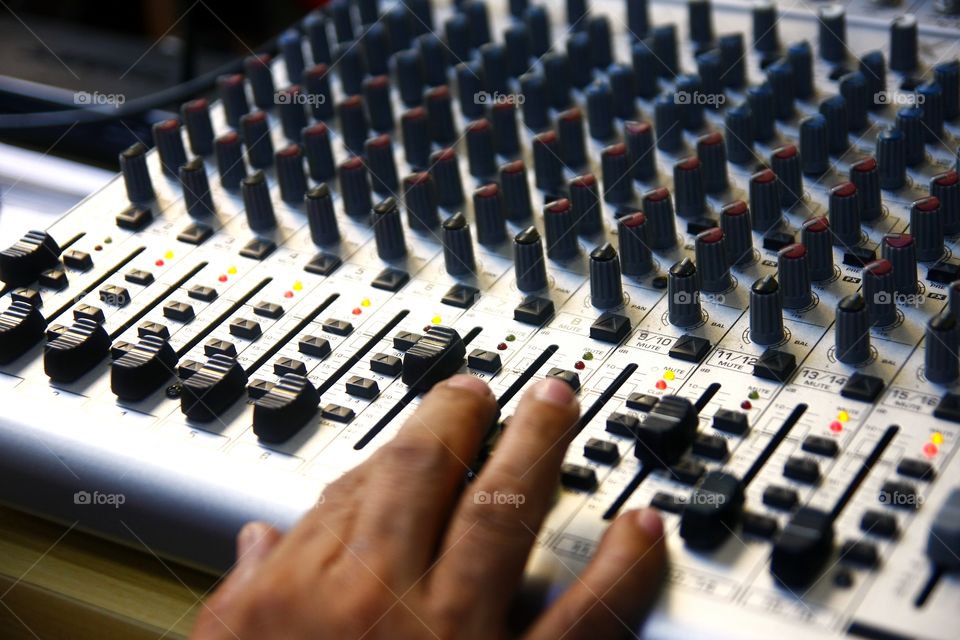 sound mixer in a recording studio