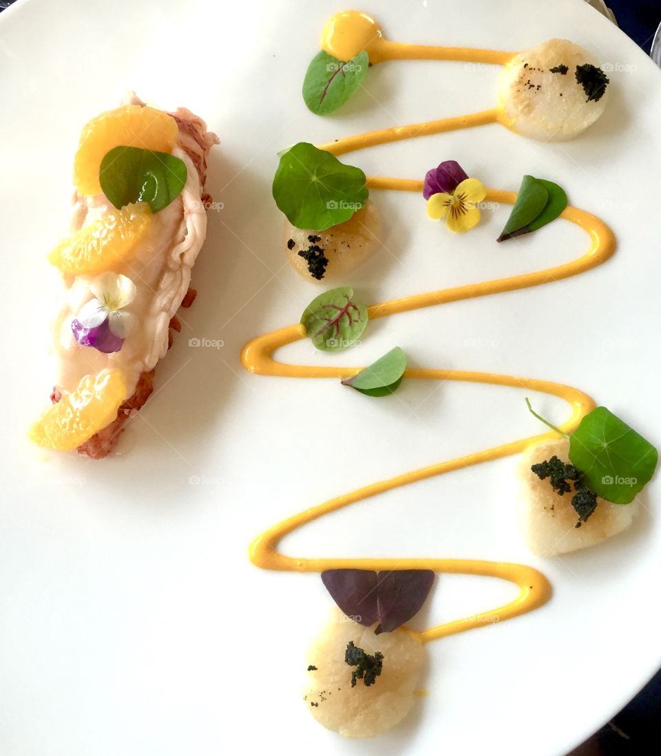 Tiger prawn with orange and scallops with caviar and mango sauce