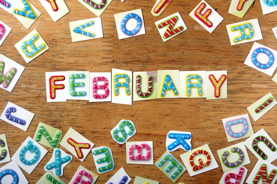 the word february. the word spelled in colorful letters