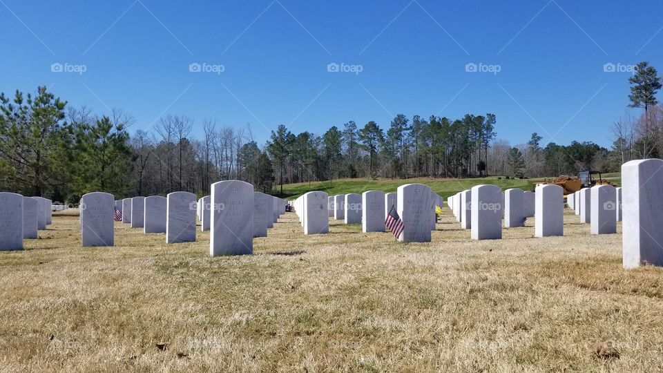 A color photo of a Veterans Cemetery where those who served now rest.