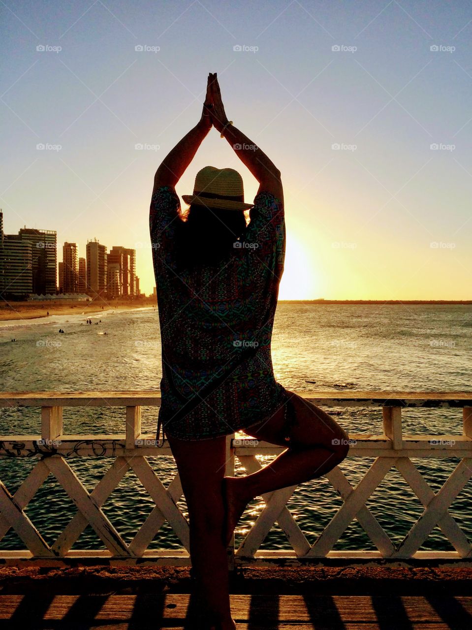 Yoga pose at sunset