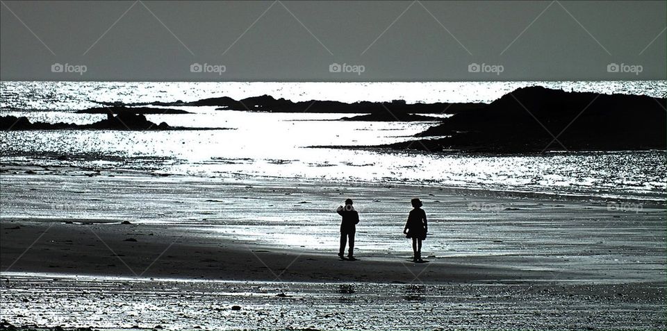 Figures on the beach 