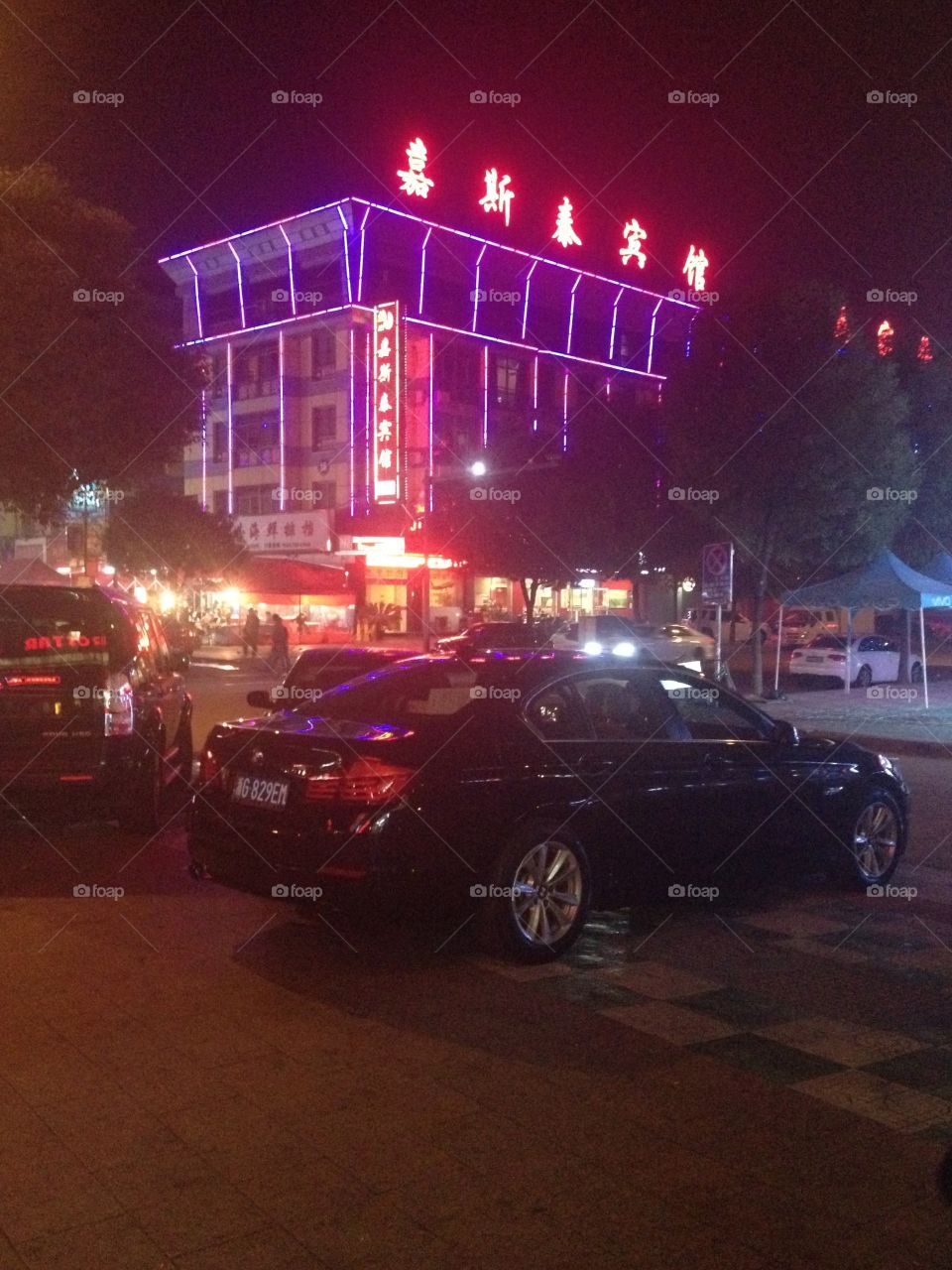 Night city lights of Yiwu and illuminated buildings