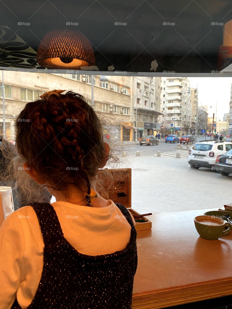 What do you understand by sitting here, drinking coffee and waching outside, mom? 