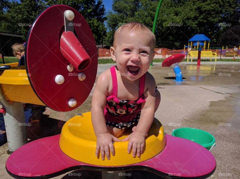 Baby girl at splash park