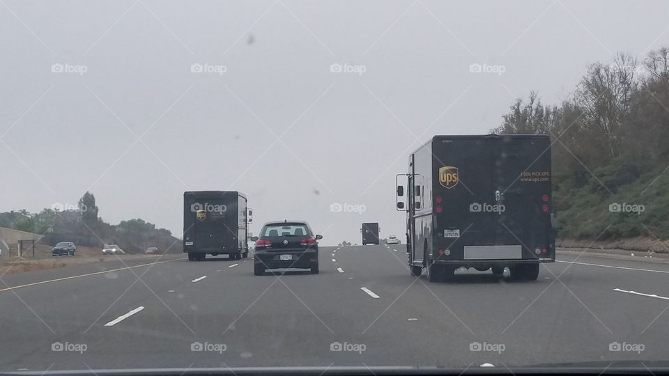 ups trucks on the road