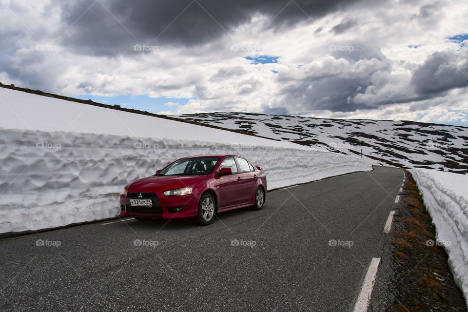 Car on snow road