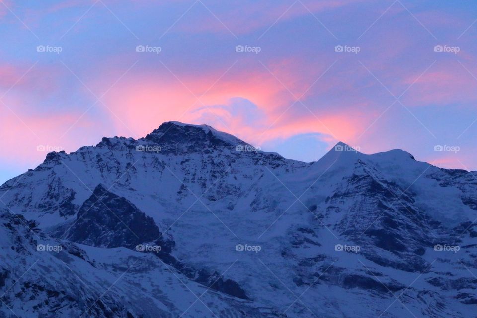 Incredible view from the Hotel Caprice, Wengen, Switzerland terrace restaurant! The colours of this beautiful sunset overlooking the Silberhorn mountain range dramatically every day and each are equally breathtaking! 