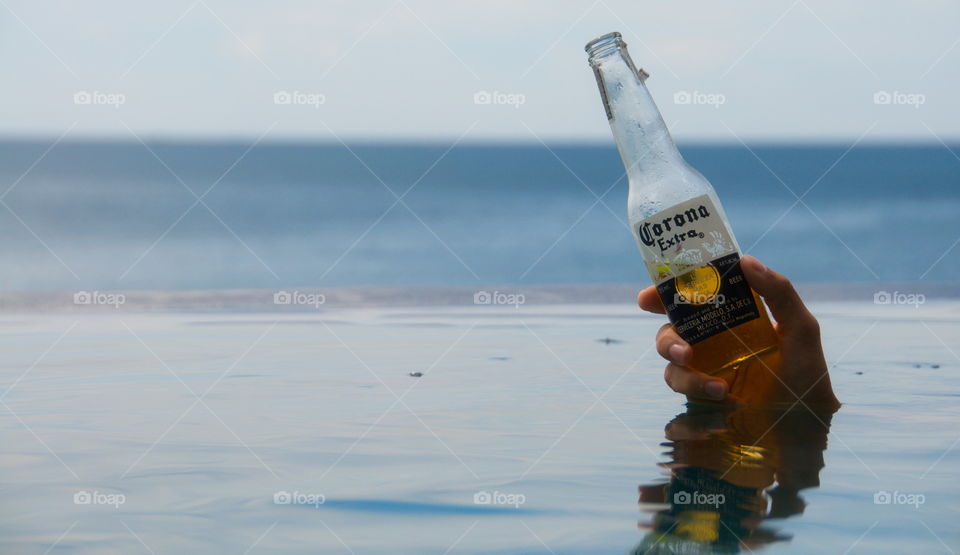 Corona beer in the infinity pool
