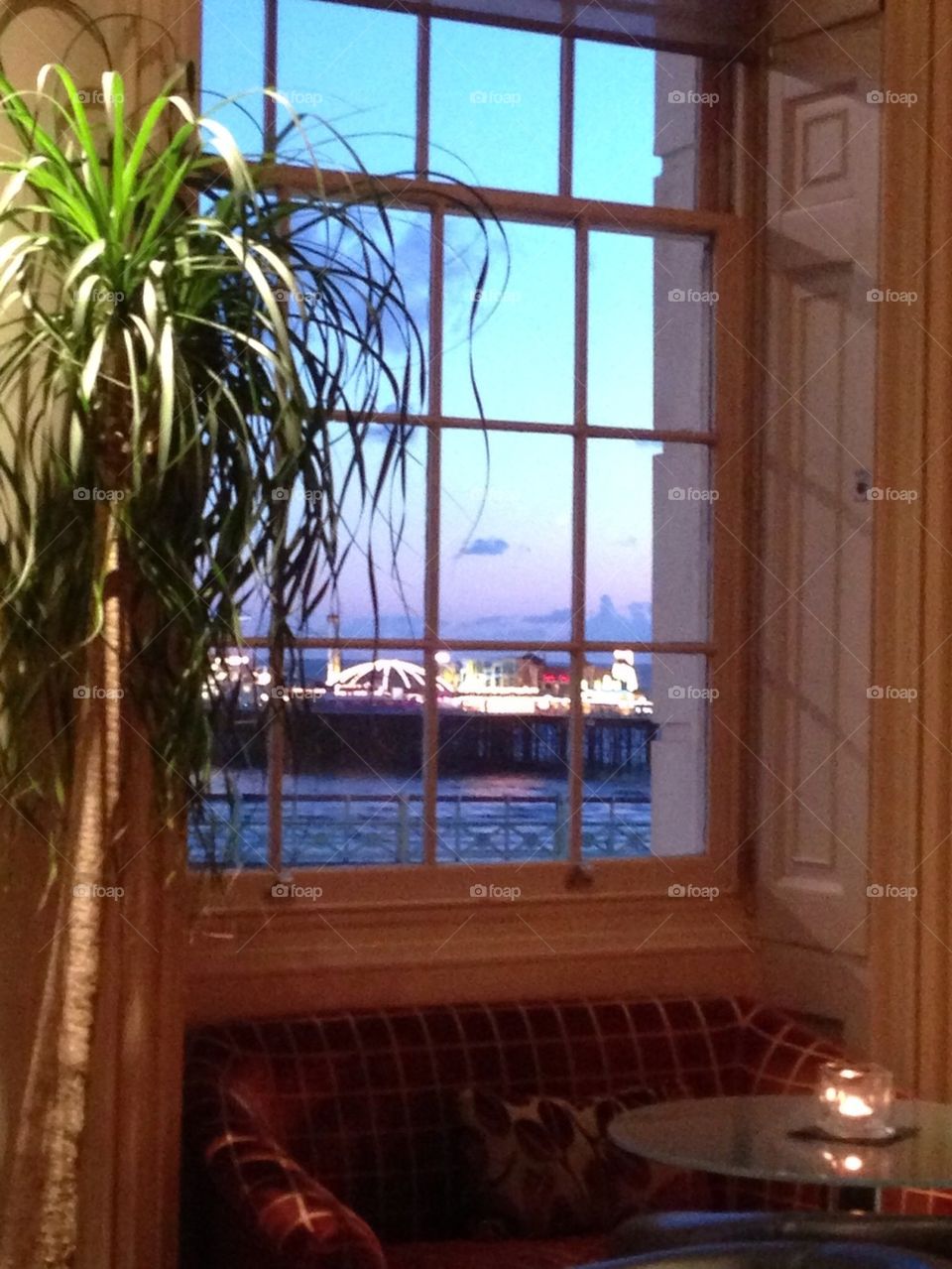 Brighton Pier through a bar window