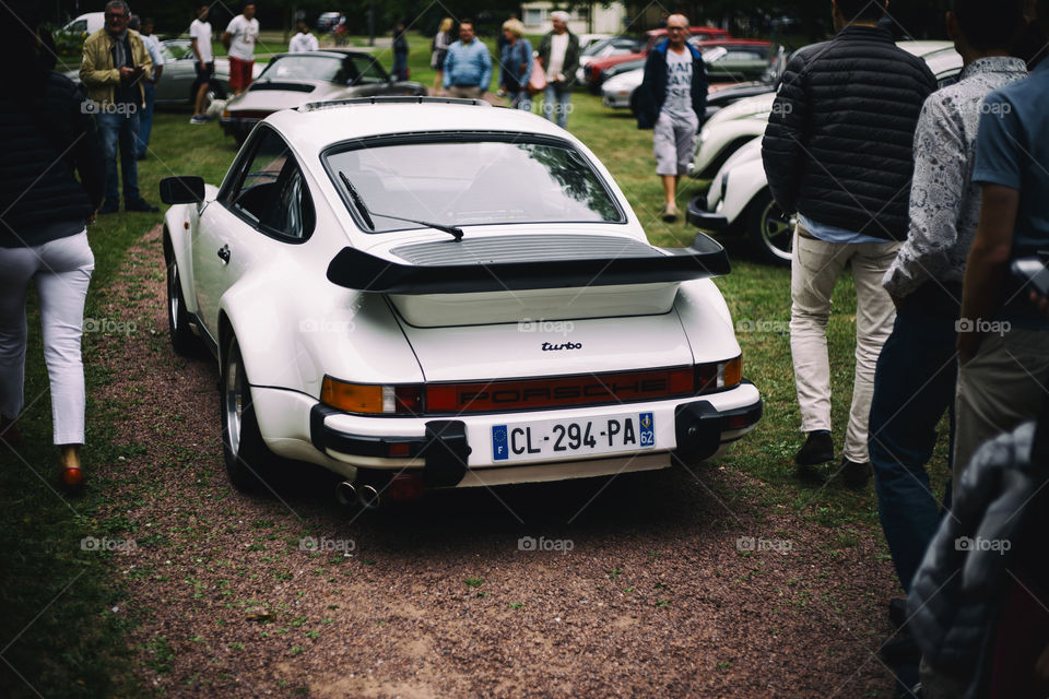 back view of legendary classic German made Porsche 911 Carrera Turbo 1987 at Le Touquet France vintage car owner exhibition
