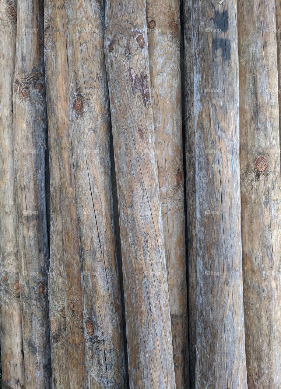 Pile of wooden poles