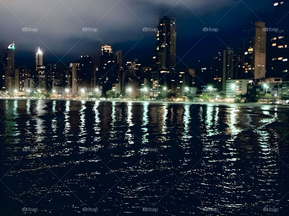 Night landscape of a city with illuminated buildings