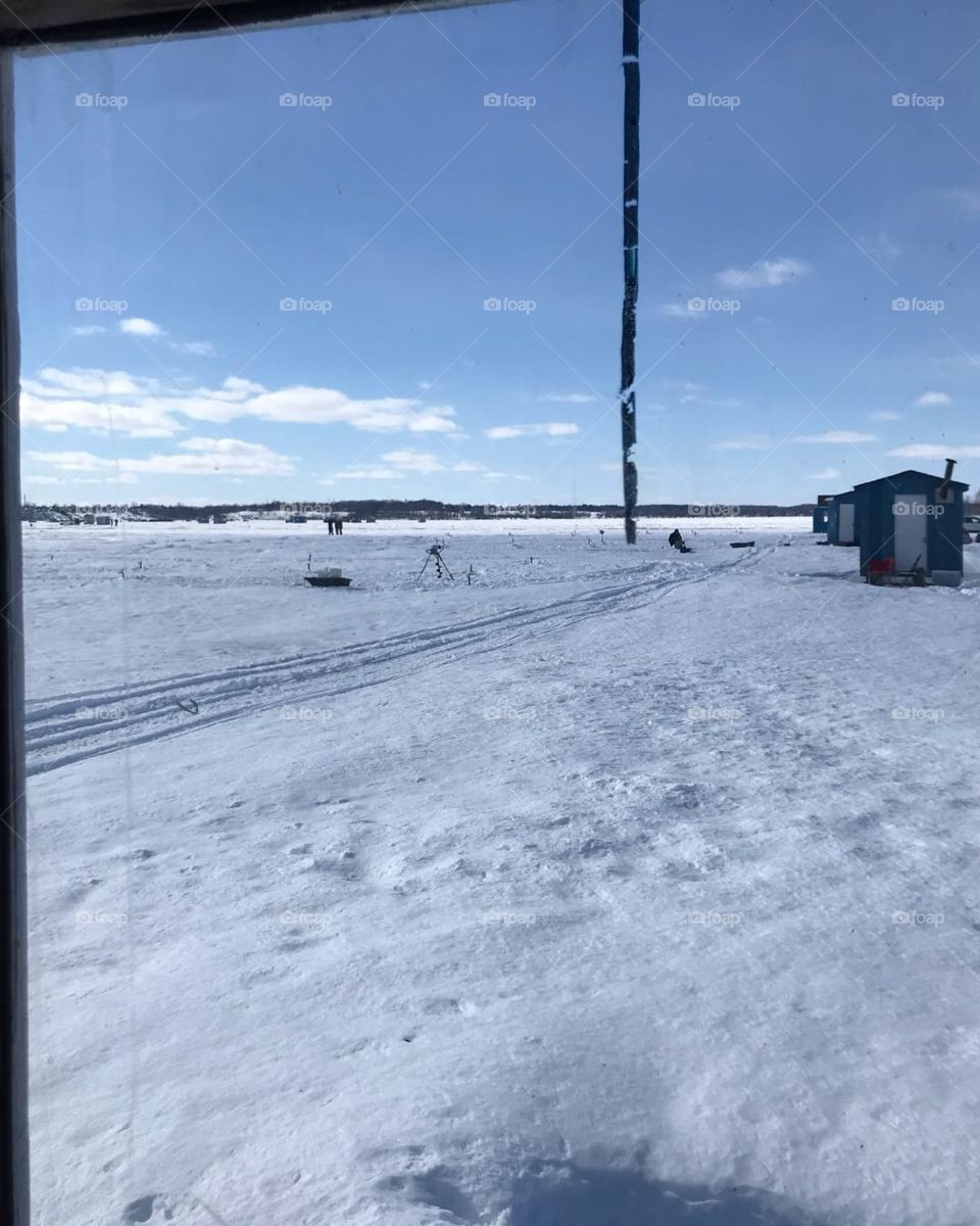 Beautiful sunny winter day for ice fishing 
