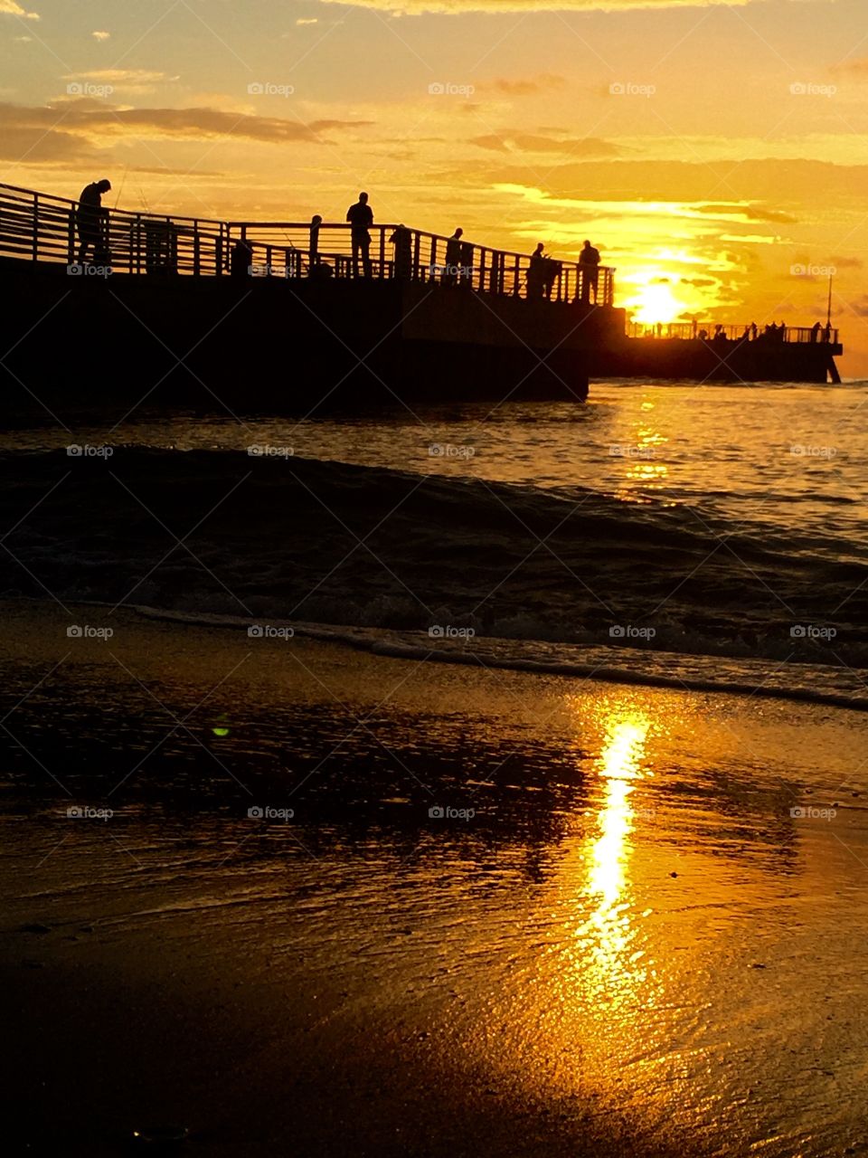 This was taken at Boynton beach pier as the fisherman wait anxiously for their morning catch and experience  an amazing as well.