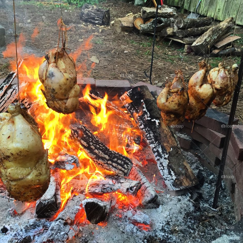Chicken over wood fire