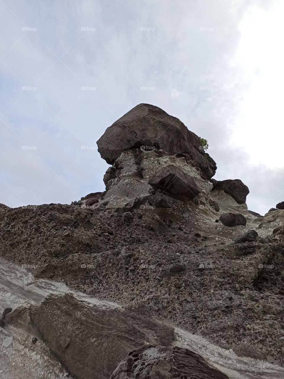Mushroom-like rock on the beach.