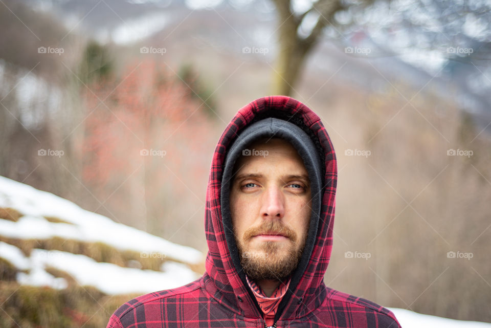 portrait of man against forest