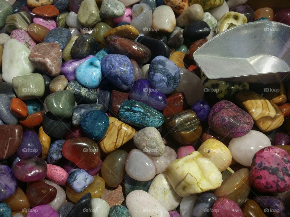 assortment of colorful polished stones