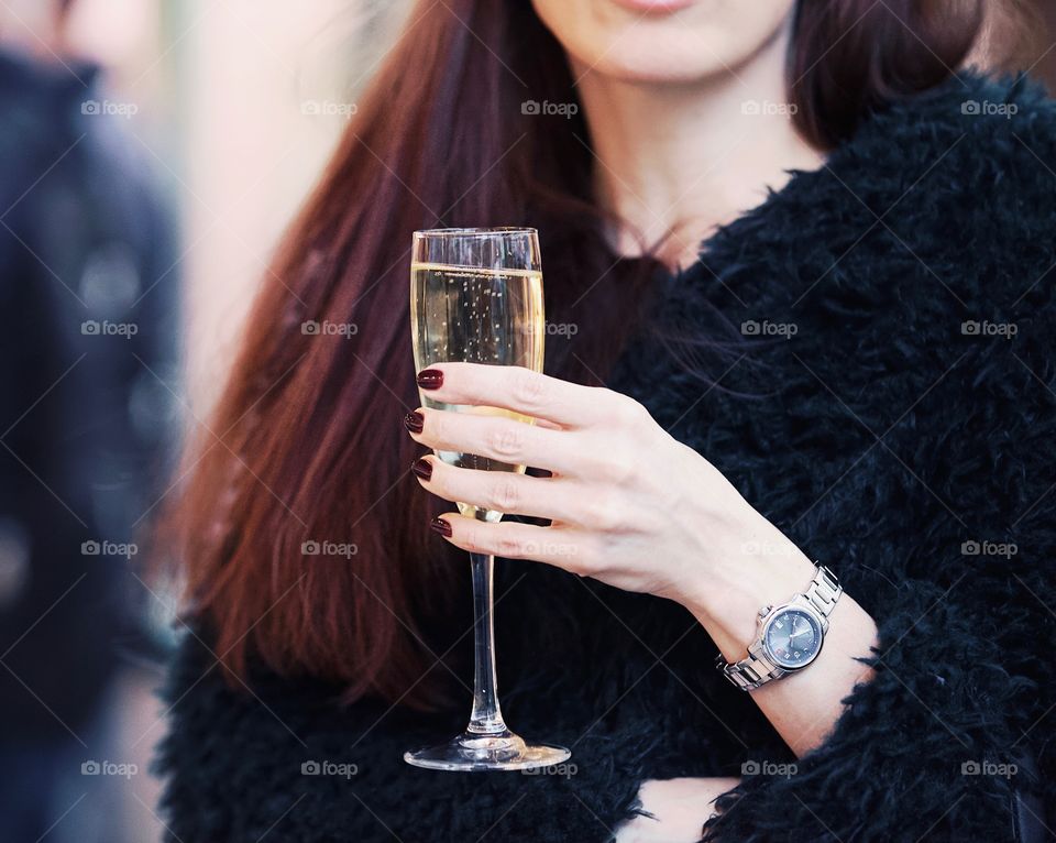Woman drinking champagne 
