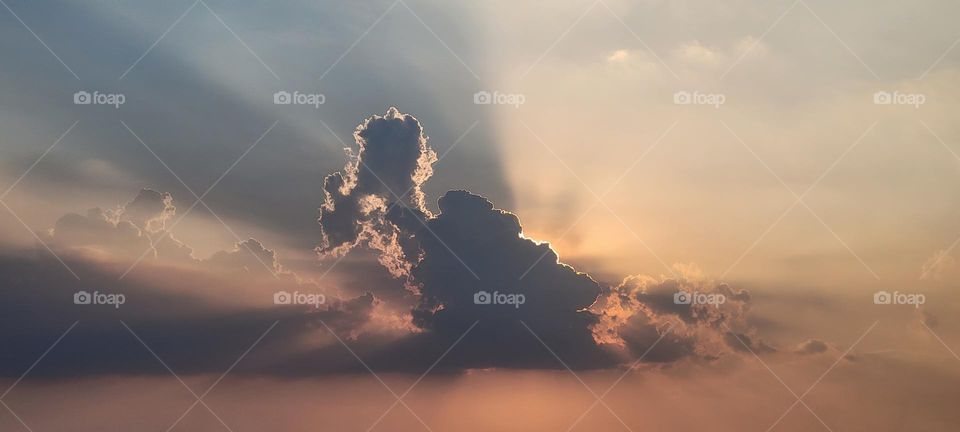 Clouds dancing with sun Phnom Penh, Cambodia