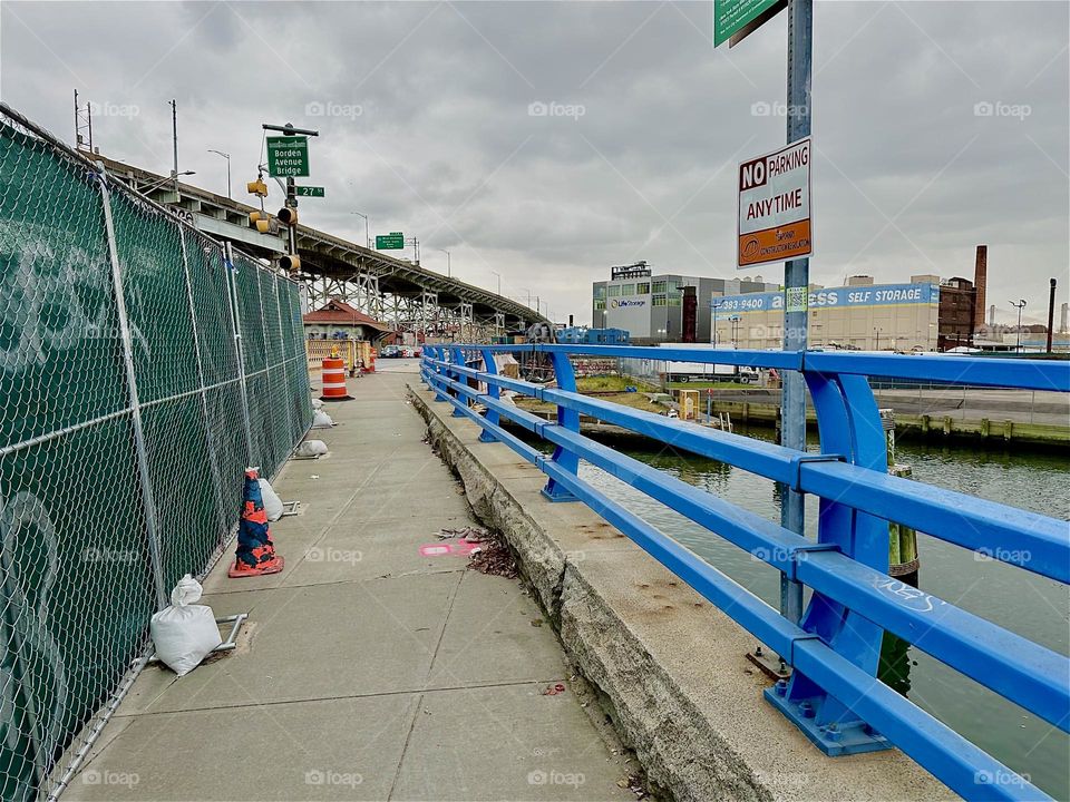 This is the “Borden Avenue Bridge” over “Dutch Kills” in LIC, Queens on an overcast day in December 2023. On the left the “Brooklyn Queens Expressway” overpass is winding its way into the distance. Hypnotic Productions