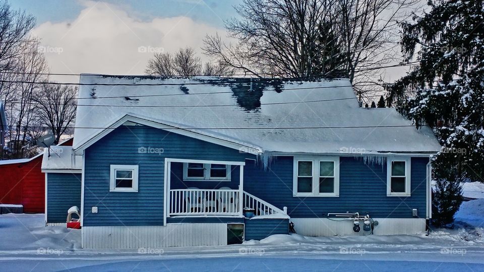 Blue house on the winter