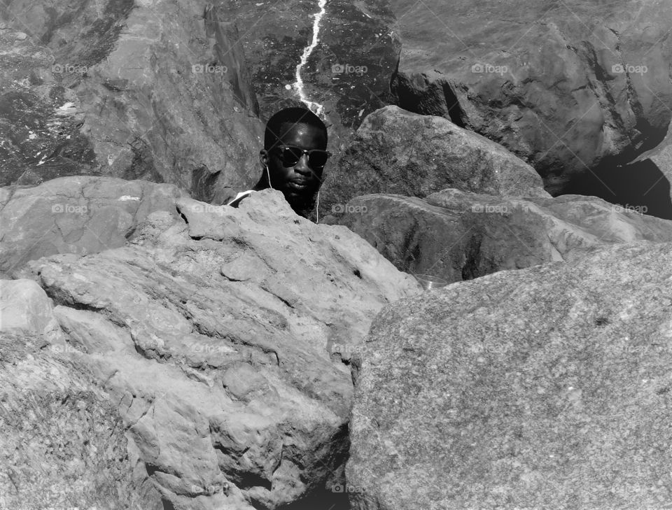 A happy grey stories of a man playing peek a boo