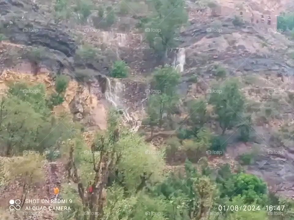 Glory be to God, the magnificent and picturesque view and the natural green trees are a view that is nothing more wonderful than it