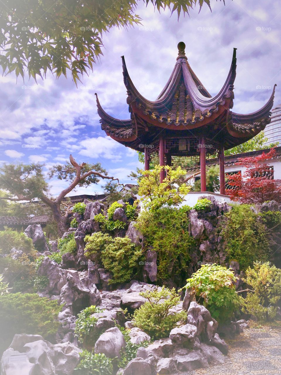 The beautifully designed Sun Yat-Sen Classical Chinese Garden in Vancouver B.C. Lush green gardens in a peaceful setting invite the visitor to pause and reflect. A little oasis in a large city.