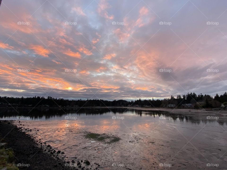 Colorful sunset reflections at the beach