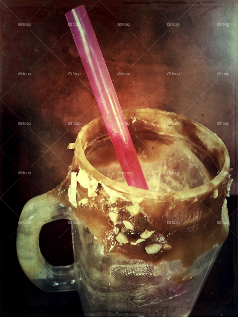 A delicious pumpkin and almond milk shake bought at the pumpkin farm. Enjoying a tasty treat on a warm autumn afternoon. USA, America