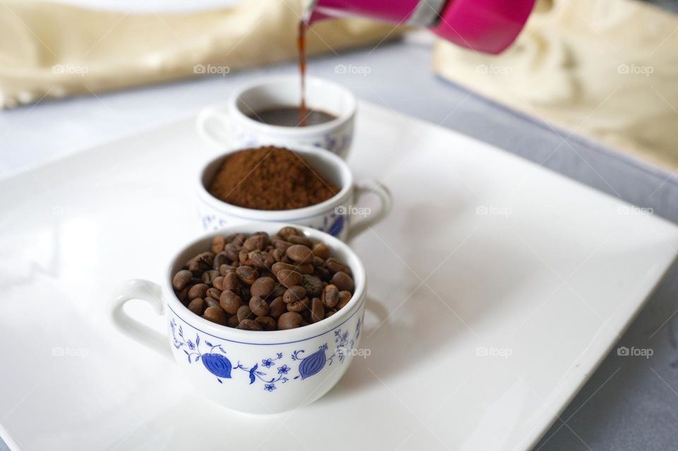 coffee beans, ground and liquid