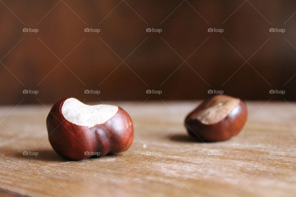 chestnuts on wooden table