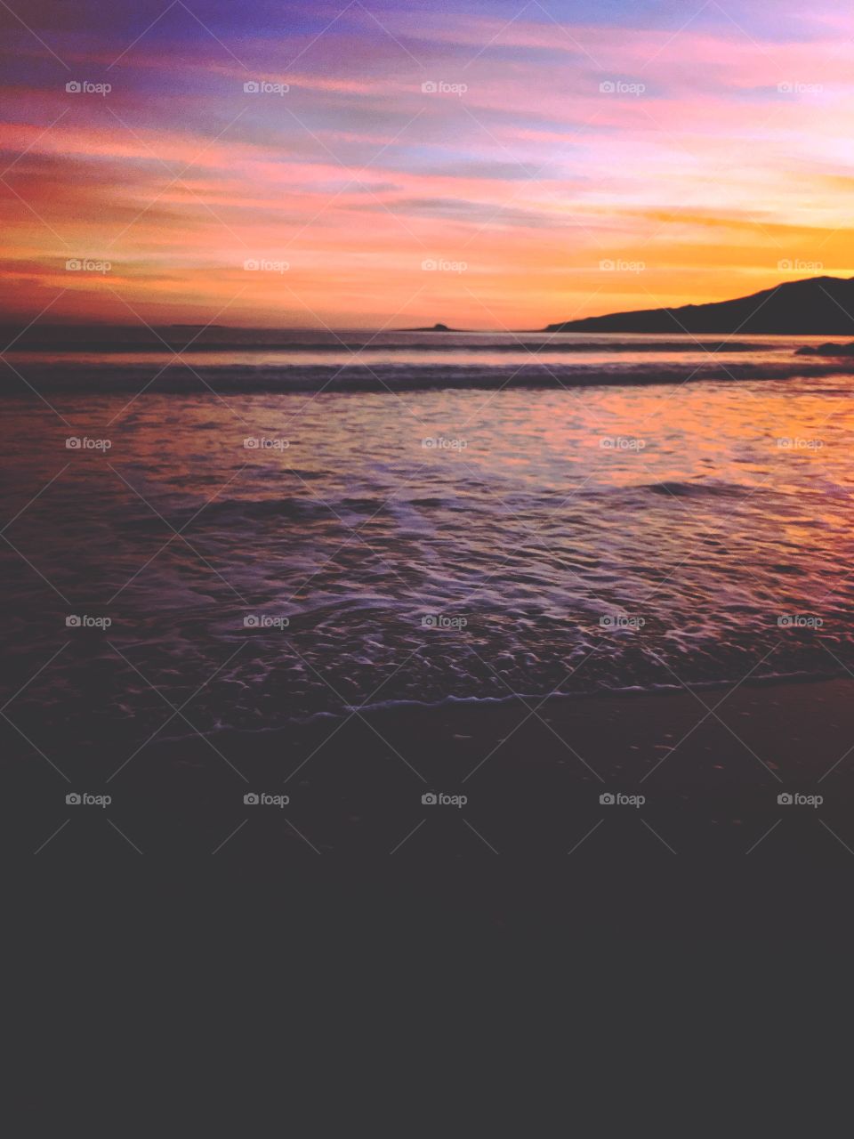 Beach shore at sunset