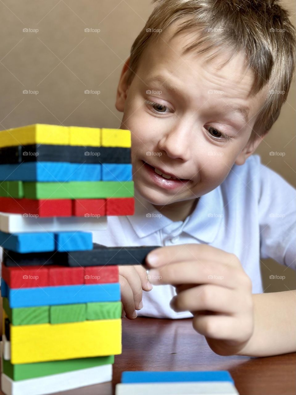 child playing jenga