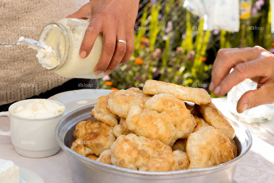 Yogurt and traditional baked little  breads, my family breakfast