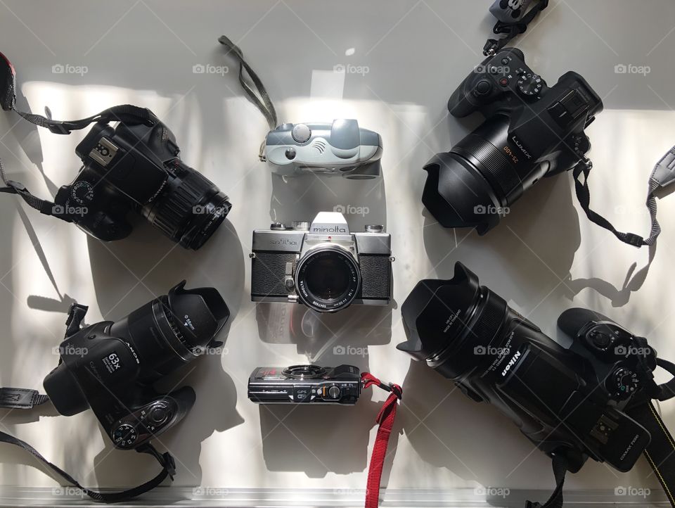 So many cameras so little time Kodak Minolta Olympus canon Sony lumix Nikon