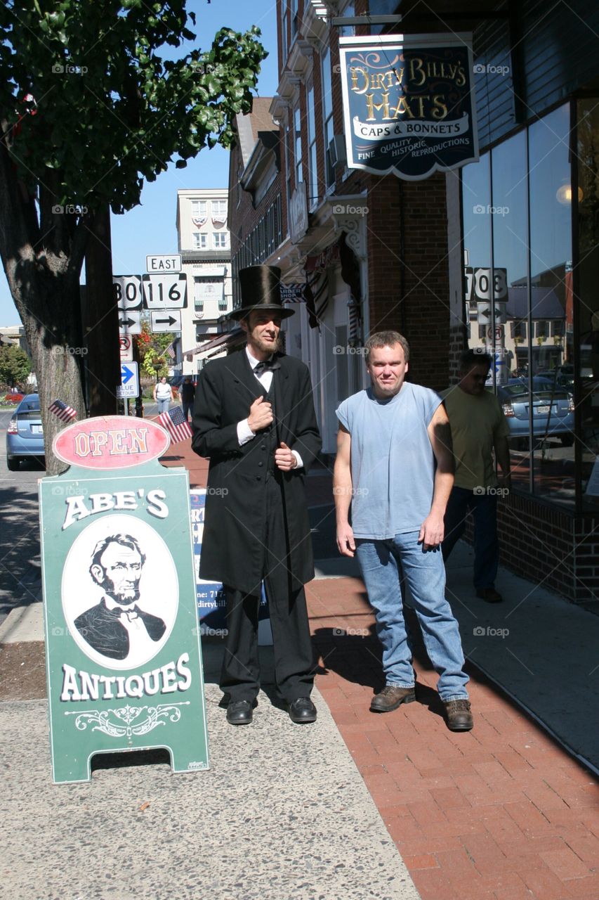 Man standing with security guard