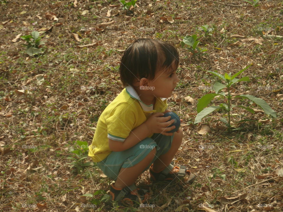 boy in tropics. small Arabic boy in jungle