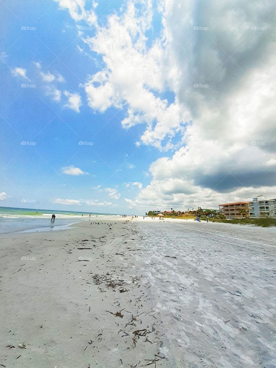 Beautiful white clouds and blue sky at Ponce Inlet Beach in Ponce Inlet, Florida.