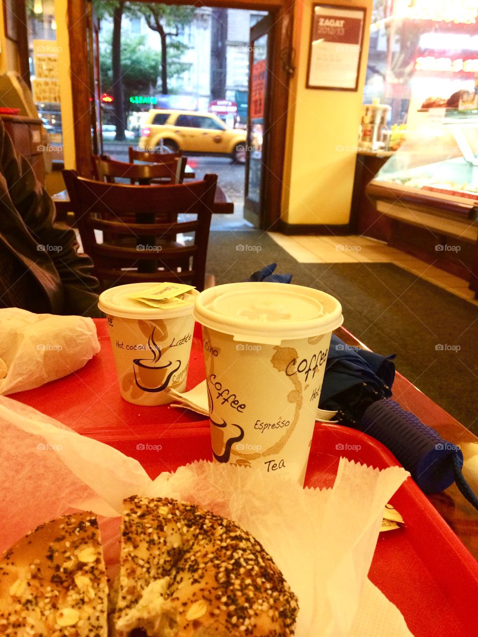 Rainy day bagels. Fresh bagels and coffee while looking out at a rainy New York Street