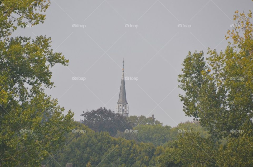 Chapel tower peaking.