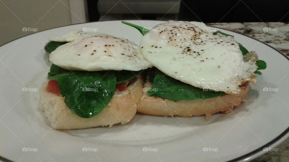 Breakfast eggs spinach on bread