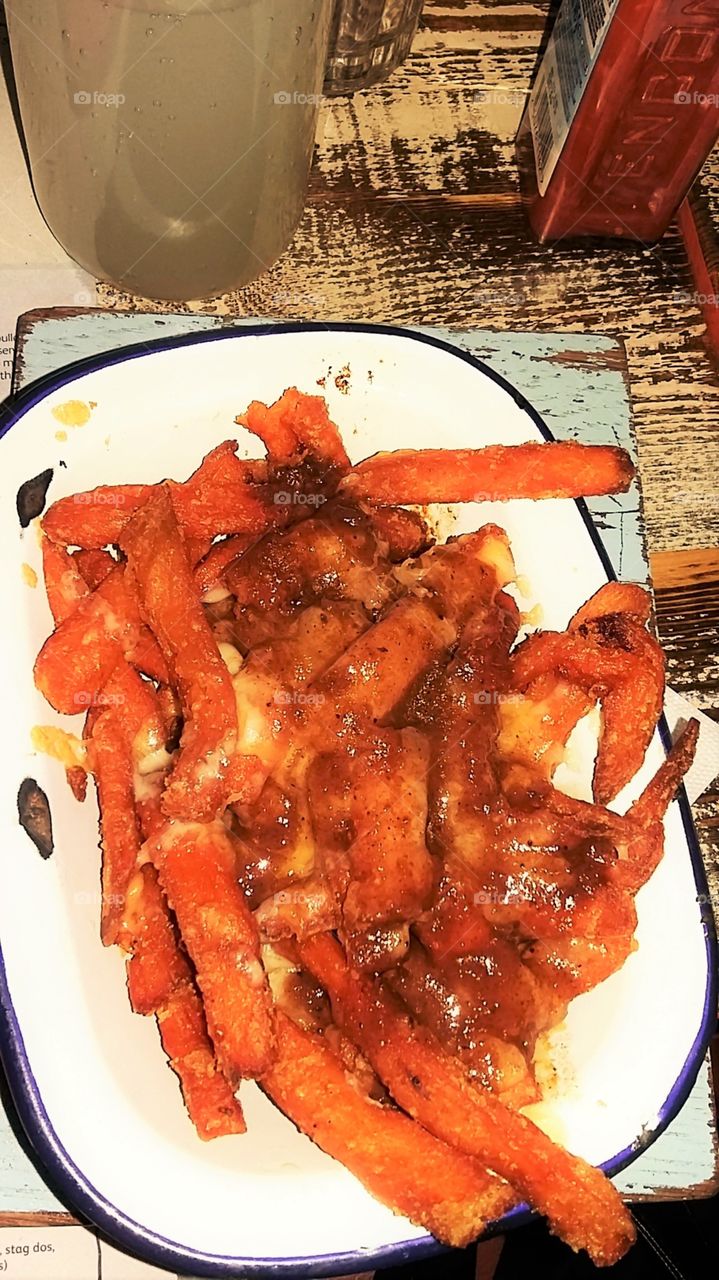 Fried Sweet Potatoes Covered in Cheese