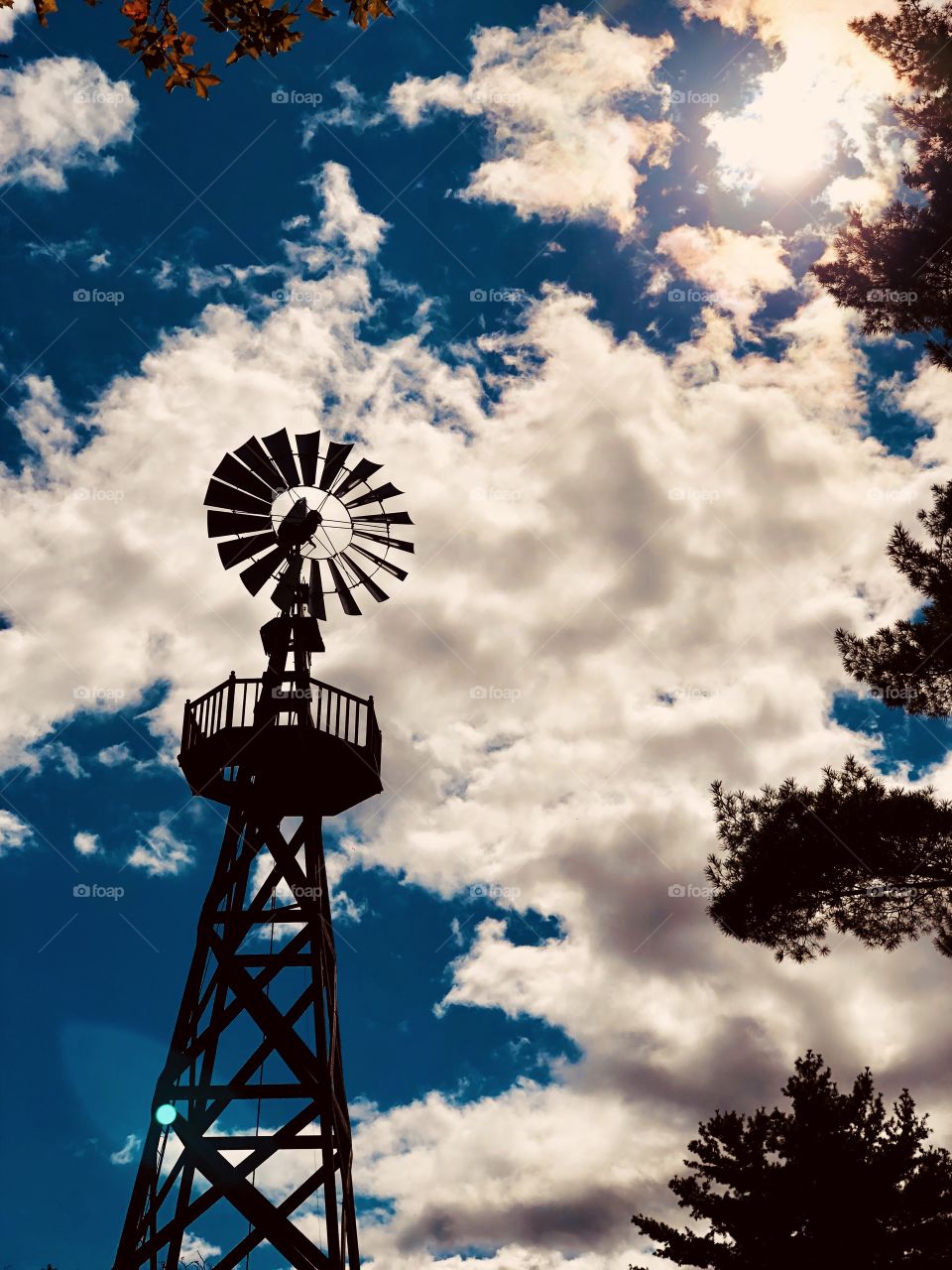Windmill In The Sky, Windmill On The Farm, Windmill Framed With Trees, Windmills In New York, Windmill In The Clouds, Capturing The Magic, Silhouette Of A Windmill, Silhouette In The Sky