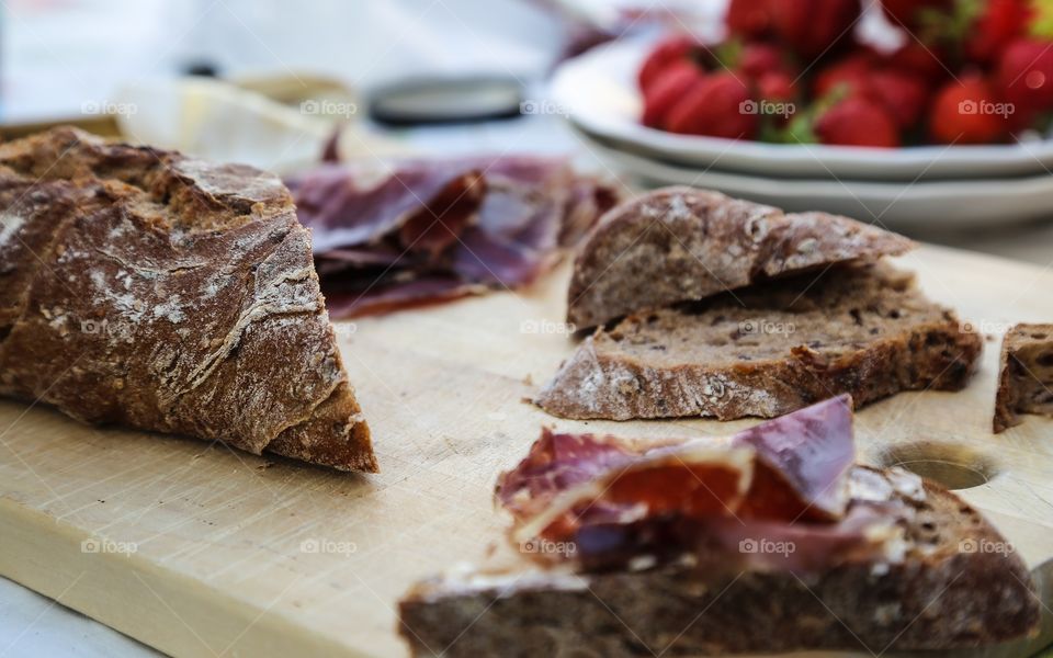 Bread and jam. Dark bread and strawberry jam